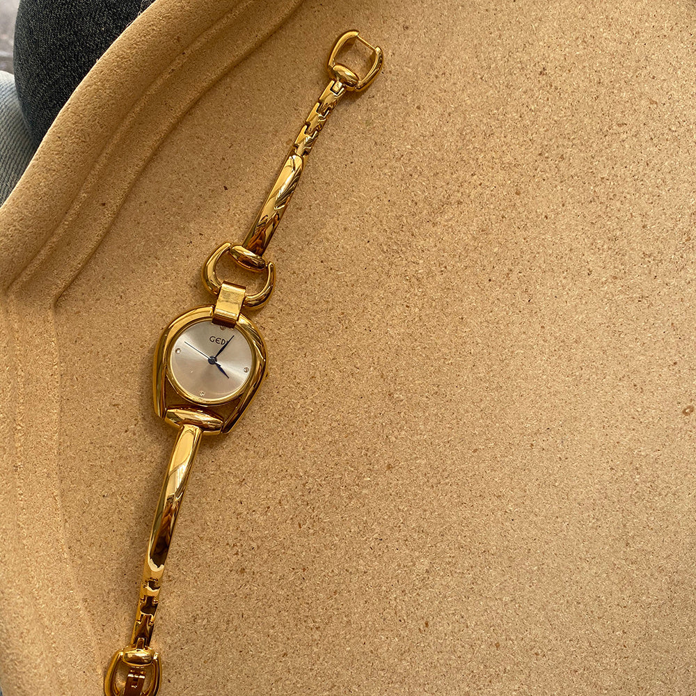 Elegant Gold Bangle Watches | Vintage-Inspired Bracelet Timepieces | Classic Women's Gold Watches | Sophisticated Ladies' Cuff Watches