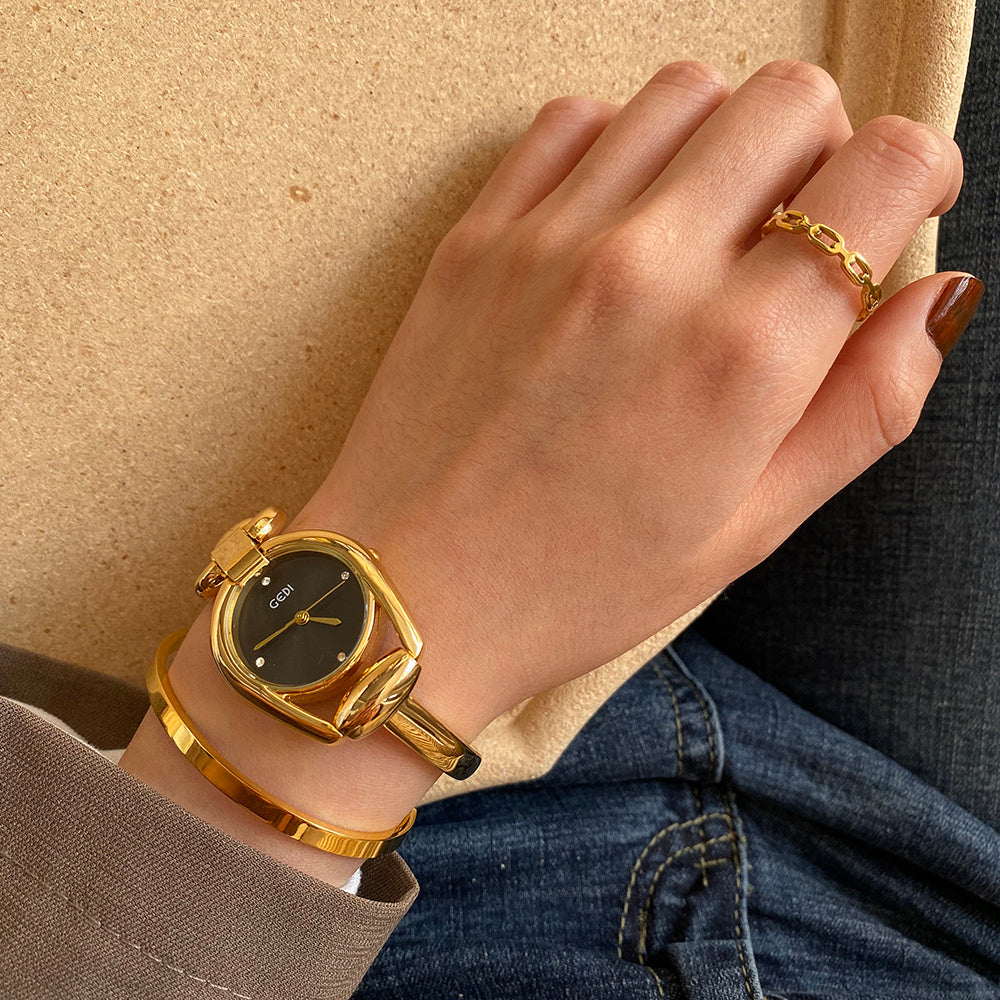Elegant Gold Bangle Watches | Vintage-Inspired Bracelet Timepieces | Classic Women's Gold Watches | Sophisticated Ladies' Cuff Watches