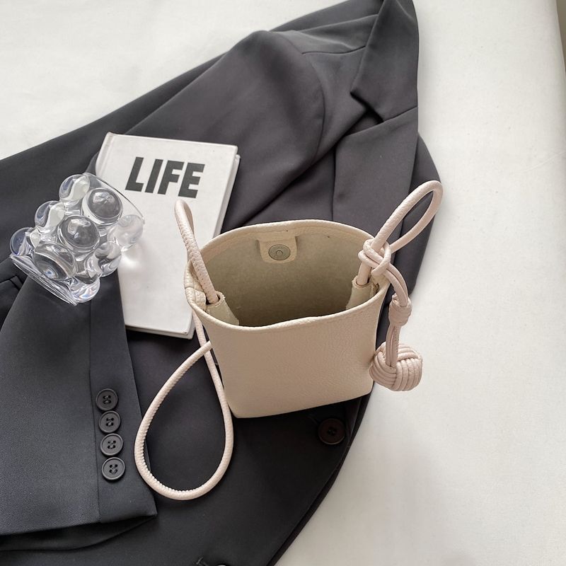 Chic Minimalist Phone Sling Bag with Pom-Pom Detail Crossbody Bag Mini Phone Bag