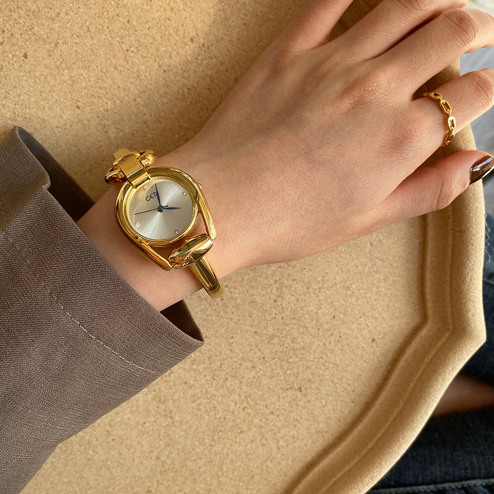Elegant Gold Bangle Watches | Vintage-Inspired Bracelet Timepieces | Classic Women's Gold Watches | Sophisticated Ladies' Cuff Watches