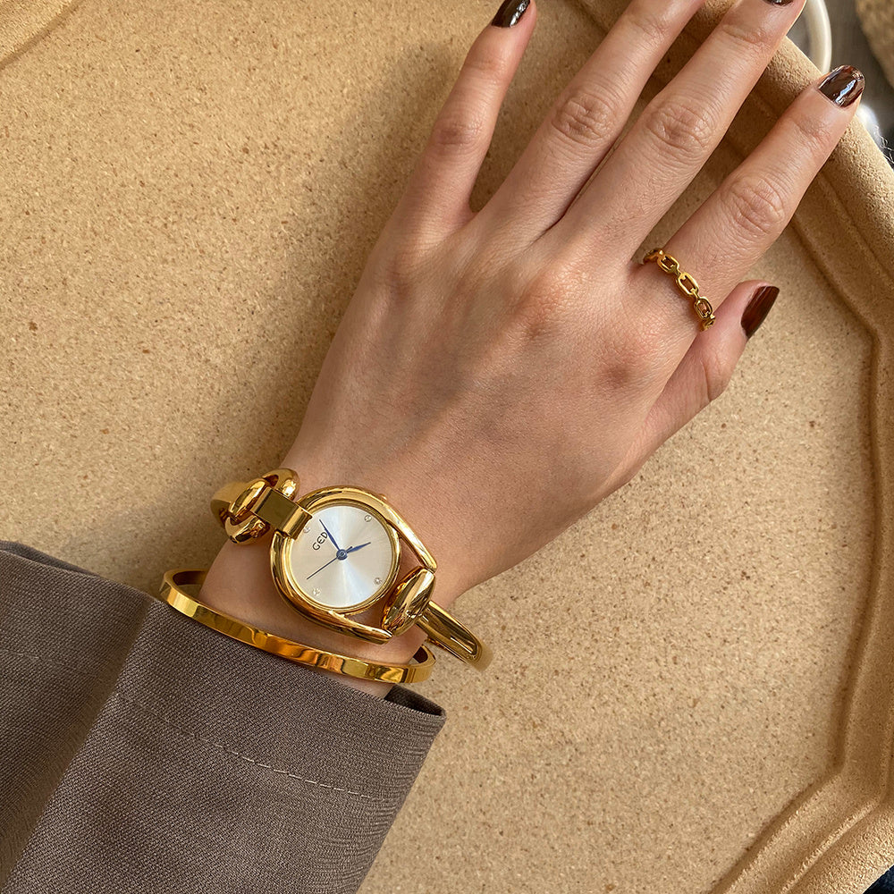 Elegant Gold Bangle Watches | Vintage-Inspired Bracelet Timepieces | Classic Women's Gold Watches | Sophisticated Ladies' Cuff Watches