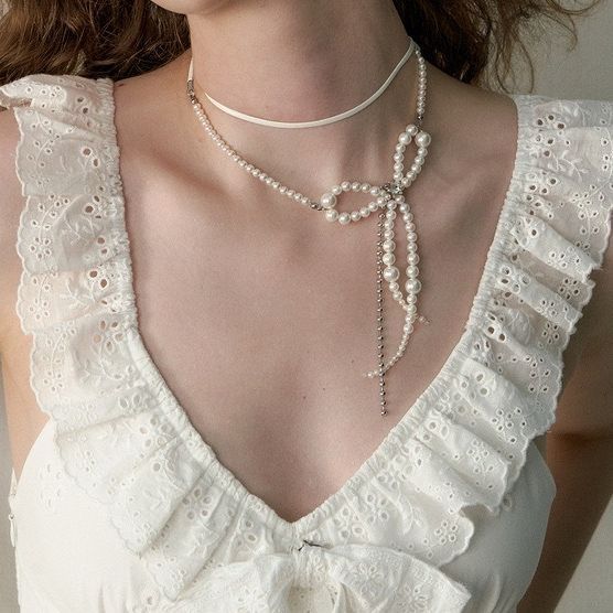 Stringed Pearls Design Bow Chain Leather String Necklace For Women's
