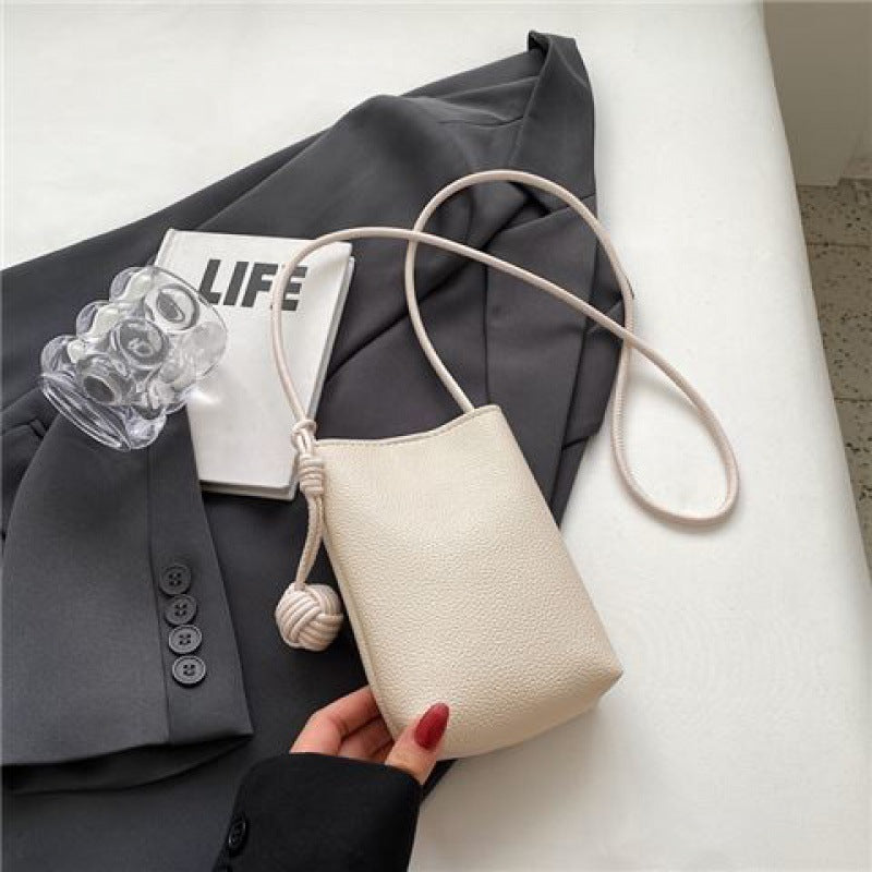 Chic Minimalist Phone Sling Bag with Pom-Pom Detail Crossbody Bag Mini Phone Bag