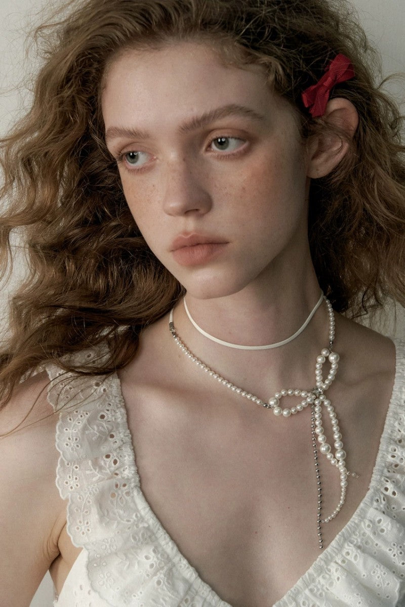 Stringed Pearls Design Bow Chain Leather String Necklace For Women's
