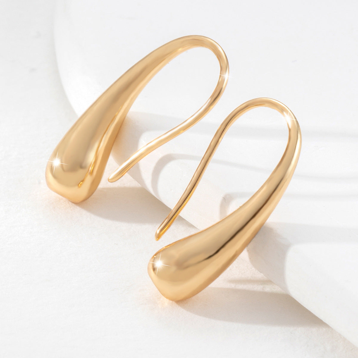 Elegant Gold Tone Teardrop Hoop Earrings | Minimalist Dangle Design Geometric Metal Glossy Surface Ear Hook