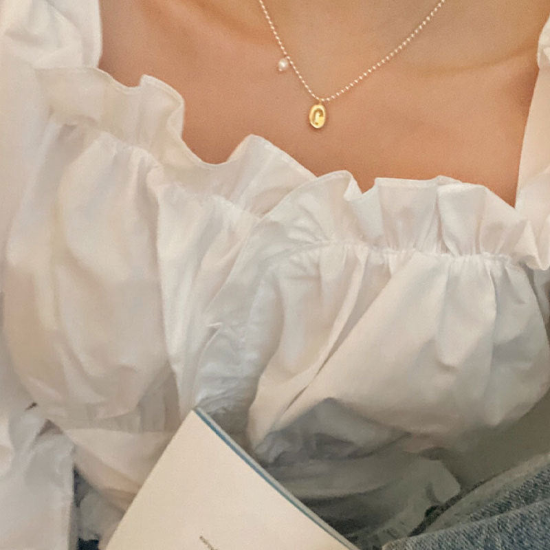 Elegant Gold Oval Pendant Necklace – Minimalist Charm with Pearl Detail Irregular Necklace Female Retro Elegant Pearl Temperament Clavicle Chain