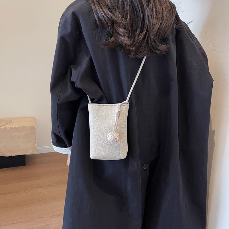 Chic Minimalist Phone Sling Bag with Pom-Pom Detail Crossbody Bag Mini Phone Bag