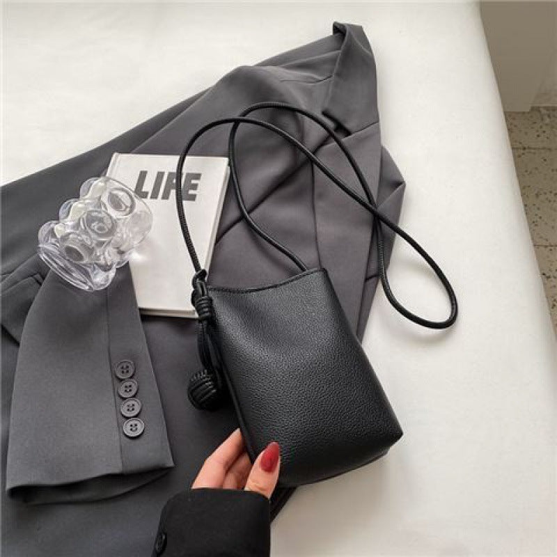 Chic Minimalist Phone Sling Bag with Pom-Pom Detail Crossbody Bag Mini Phone Bag