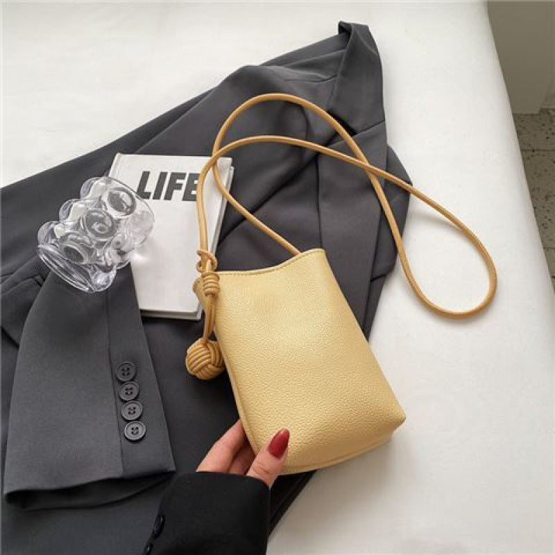 Chic Minimalist Phone Sling Bag with Pom-Pom Detail Crossbody Bag Mini Phone Bag
